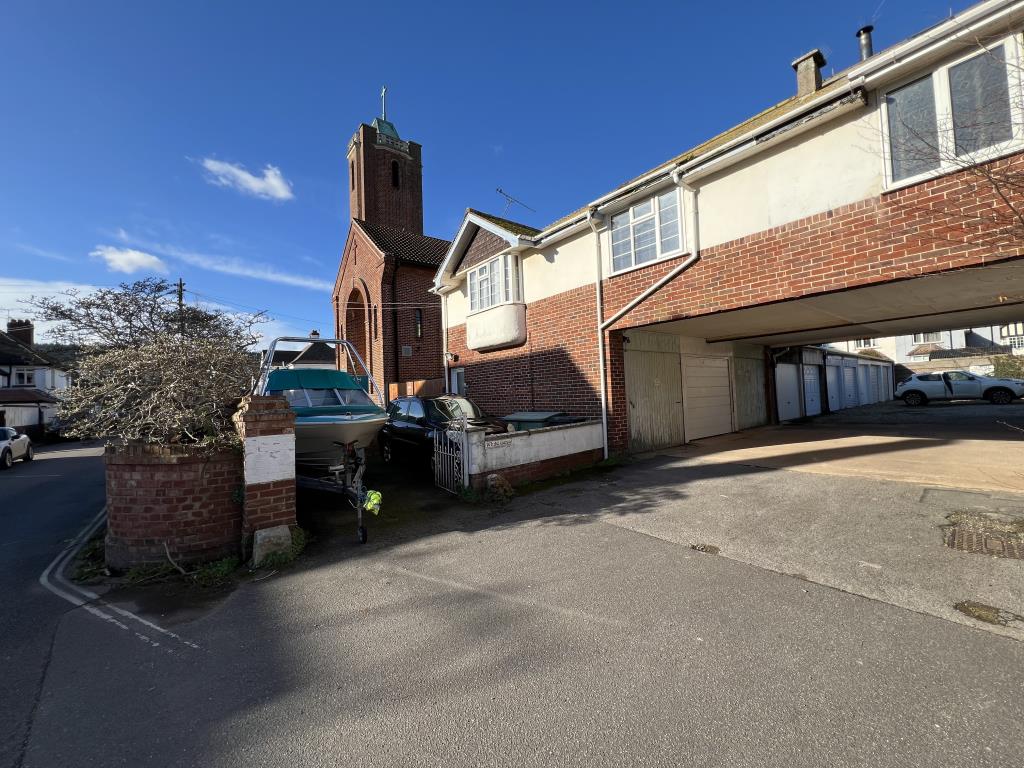 Lot: 148 - TWO-BEDROOM COACH HOUSE FOR UPDATING - View of gates to parking/garden